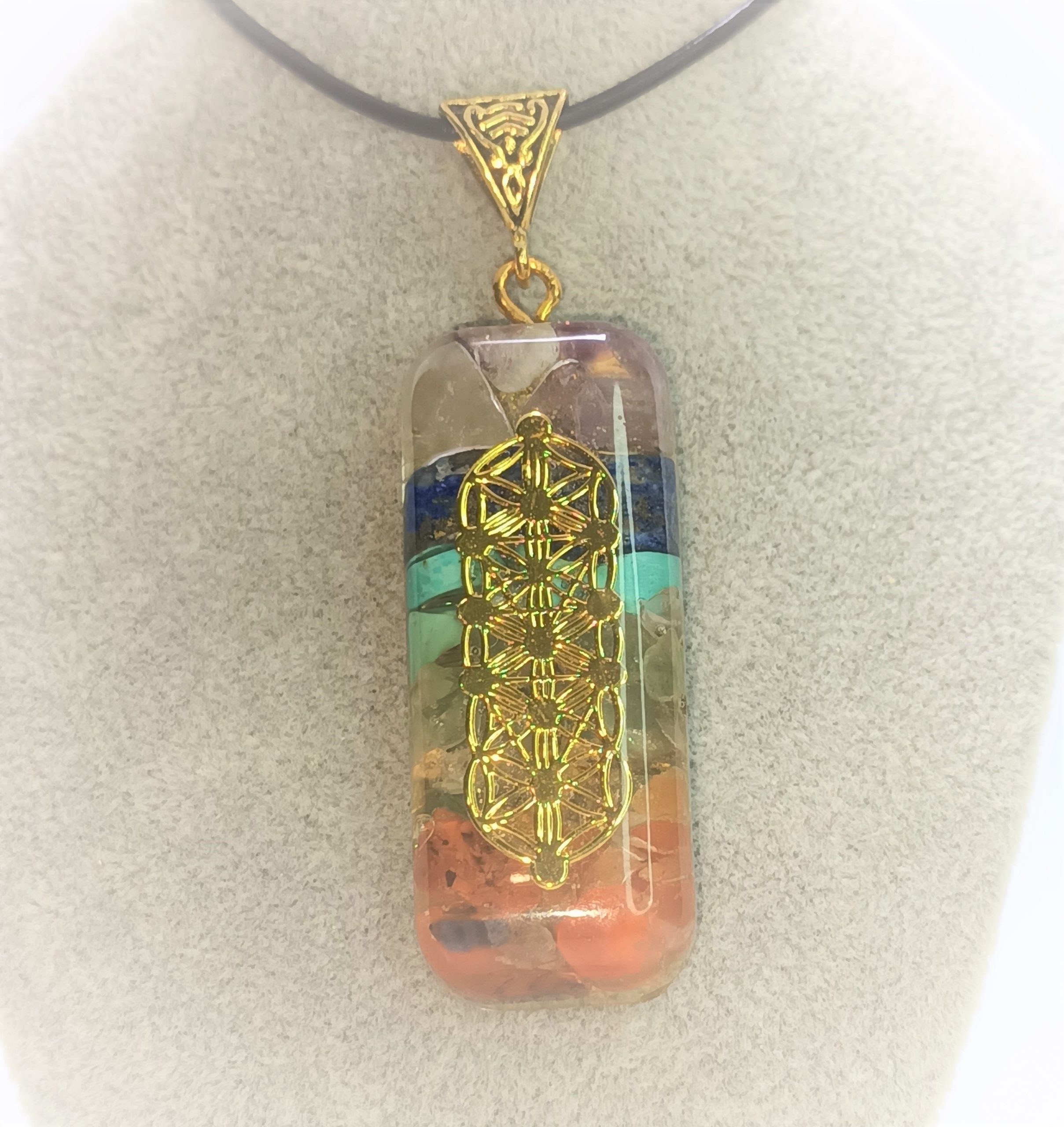 Pendentif orgone 7 chakras et merkaba